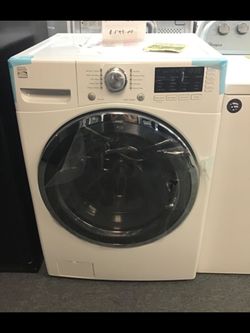 New scratch and dent kenmore front load washer. 1 year warranty