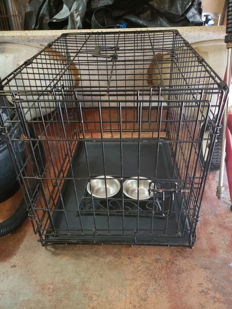 2 small Dog kennels 2 feet by 1.5 by 2 feet