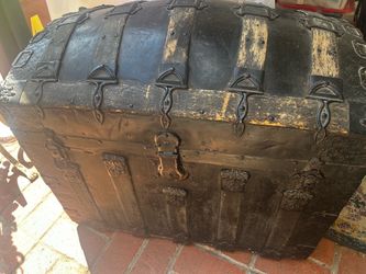 Antique Victorian camelback embossed trunk