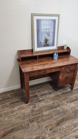 Rustic brown vintage-style computer and writing desk with a hutch and four storage drawers
