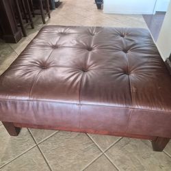 Brown square ottoman