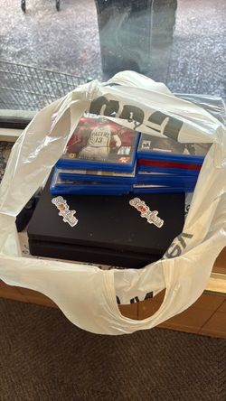 PS4 Slim Console with Game Bundle
