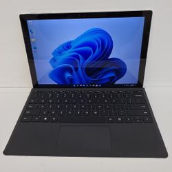 Microsoft Surface Pro 4 

Windows 11
 Intel Core i5
 8GB RAM 
256GB SSD