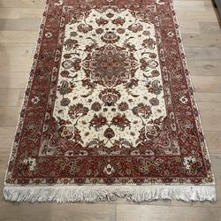 Hand knotted wool rug
