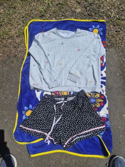 Time and TRUtm Long sleeve night time  sweater with color stars size M (8-10), and kausie  night time shorts black and white with pink trim  size larg