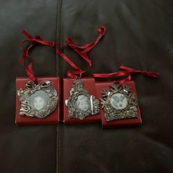 Three picture holding christmas oraments, All Three For $5.00.