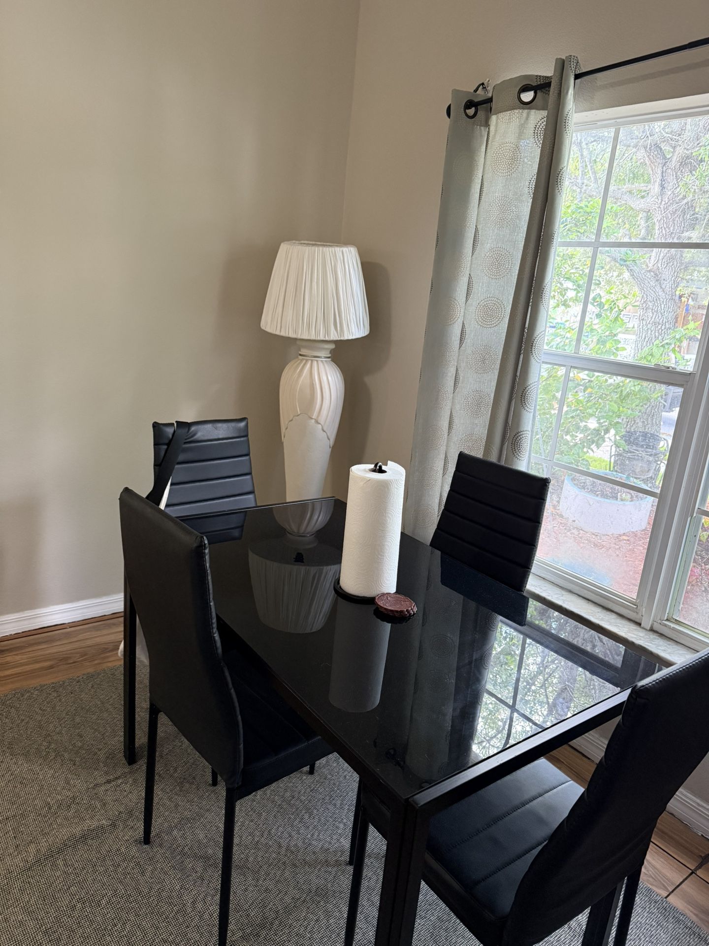 Black modern dining table with 4 chairs