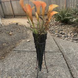 Orange Flowers And Wicker Vase
