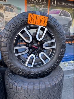 GMC. STOCK WHEELS. 35x12.50R20.  NITTO RIDGE GRAPLER