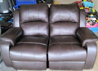 $400 Leather Reclining Sofa like new