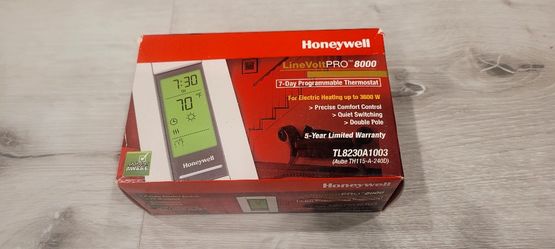 Honeywell TL8230A1003 Line Volt Thermostat 240/208 VAC 7 Day Programmble