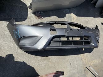 2015 - 2019 Nissan Versa Front Bumper Gray Sedan w/o fog lamps stock#11028