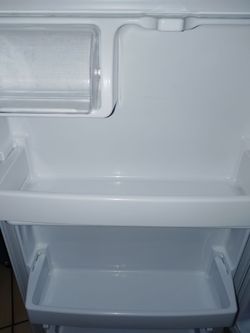 Hotpoint, White Refrigerator. Wide28"    Depth 29"1/2     Tall66"3/4