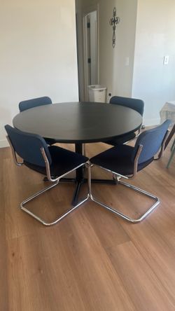 Black round table with chairs included!