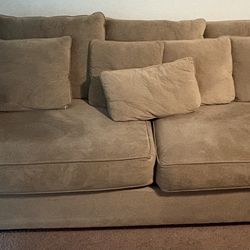 3 light brown couches
