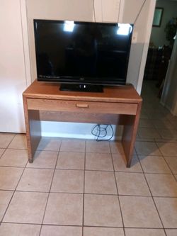 1 wood desk ,TV stand good conditions .