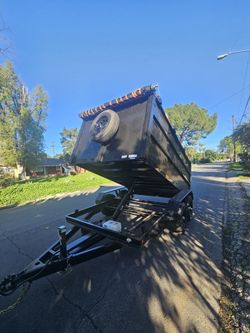 NEW DUMP TRAILERS 12x8x4 ROLLING TARP AND SPARE TIRE 2026 YEAR ELECTRIC BRAKES LIGHTS REMOTE CONTROL TITLE IN HAND READY FOR WORK,se habla ESPAÑOL 