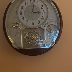 Melodies In Motion Clock