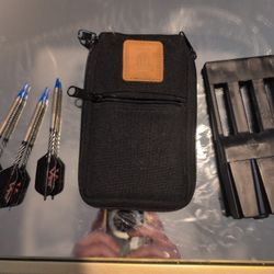 Viper brand darts with black flights, a black fabric Dartmaster case with a distinctive brown leather logo patch, and a hard plastic STB dart case ins