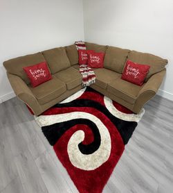 Beautiful and comfortable 2-Piece brown microfiber sectional sofa. Delivery available for an additional cost.