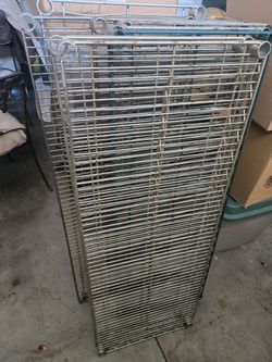 5 shelves with poles. Dismantled for easy transport