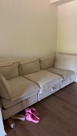 Beige sofa with storage space