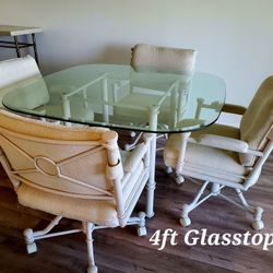 Table And 4 Rocking Roller Chairs 
