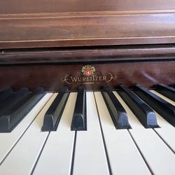 “WURLITZER PIANO FOR FREE”