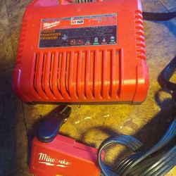 MILWAUKEE M18 BATTERY CHARGER HAS AC AND DC POWER 