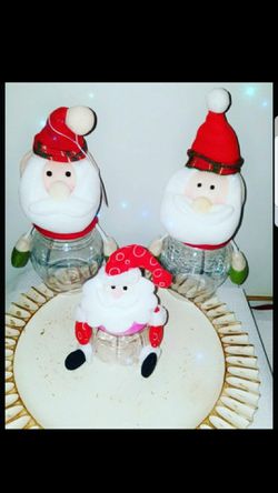 Brand new plastic Christmas jars for candies/chocolates....2 big & 1 small) $10 for a set
