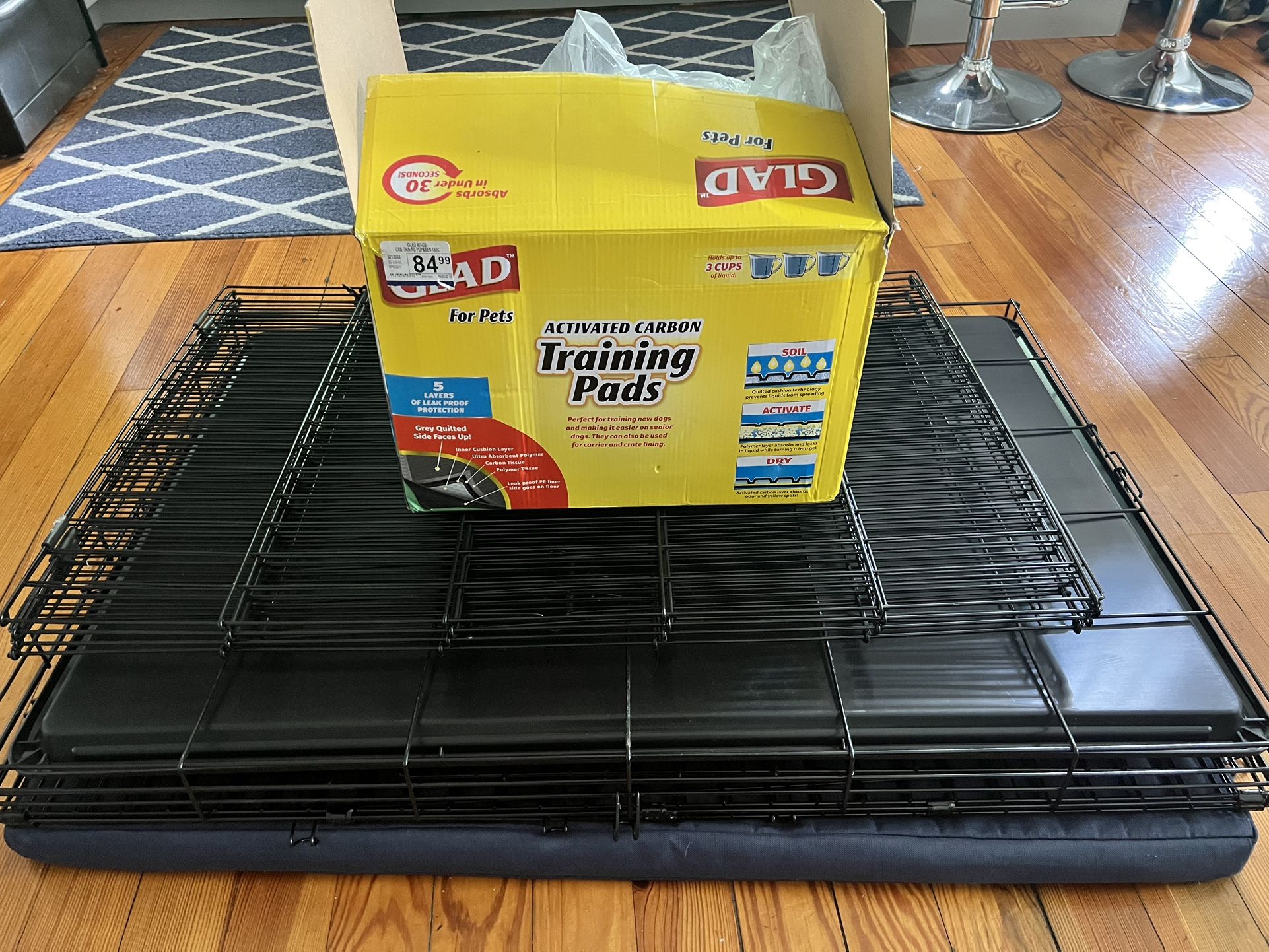 Dog Crate And Fencing And Sleeping Pad