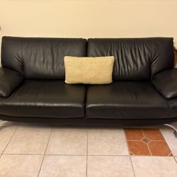 Sleek Looking Black Leather Couch 