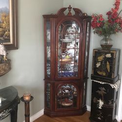 Corner Curio With 3 Shelf’s On Top And And 2 On Bottom