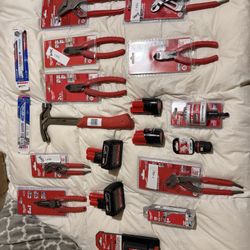 Assorted Milwaukee Tools And Batteries