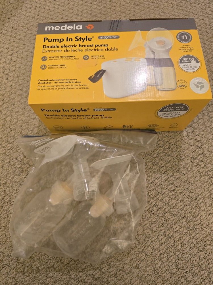 brand new medela pump and style sealed and also extra pump parts