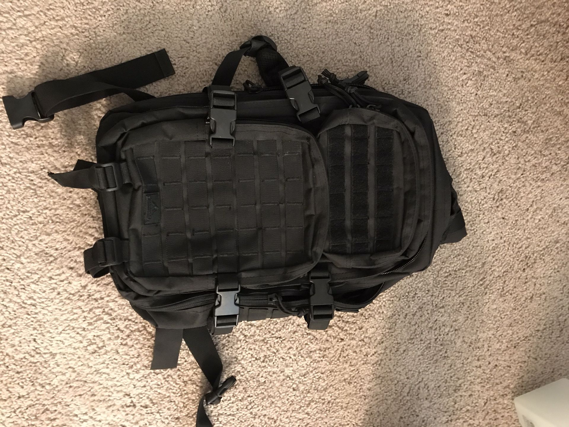 Small black tactical backpack