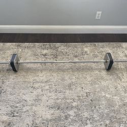 A straight bar and quick-fix dumbbell plates 6 pcs. of 5 lbs