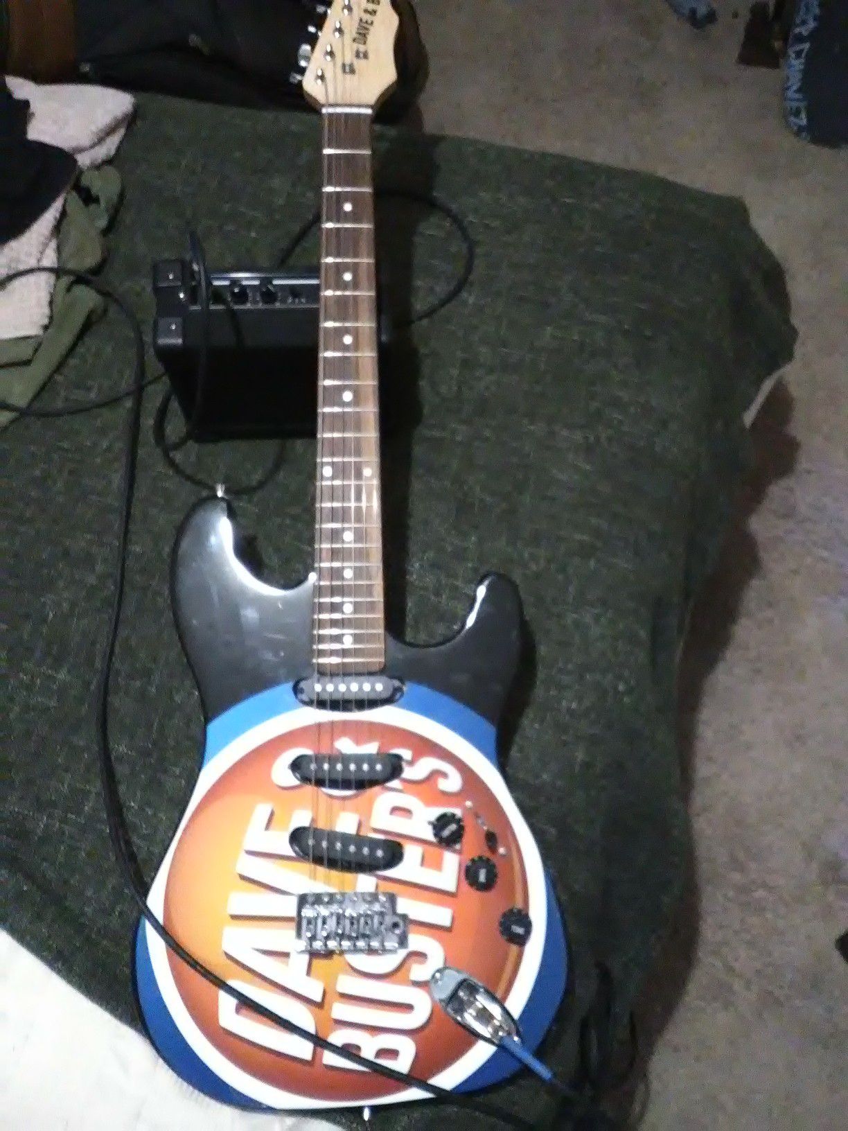 Dave and Busters guitar with amp