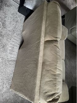 Small cloth couch from Ashley’s Furniture