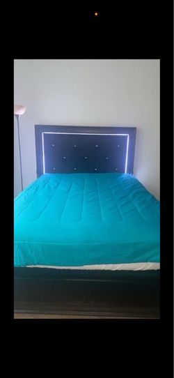 Queen size bed with led white lights