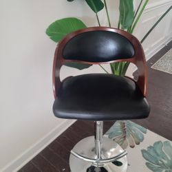 Two Black Leather And Wood Bar Stools