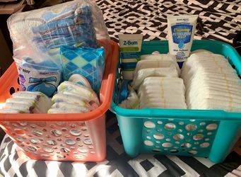 Diapers size 6, pull ups 2t-3t baby wipes, sassy diaper sacks and two tubes of diaper rash cream
