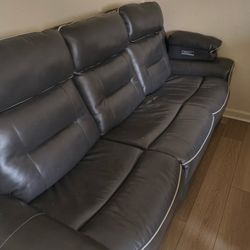 Grey Leather Reclining Couch 