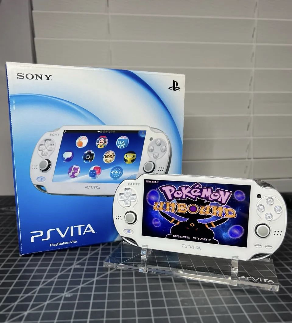 Modded PlayStation Vita 1000 OLED With Games and Charger