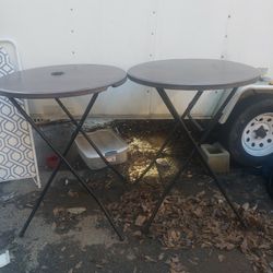 2 foldable round tall tables. 1 has a ashtray built into it. Make offer for 1 or both.