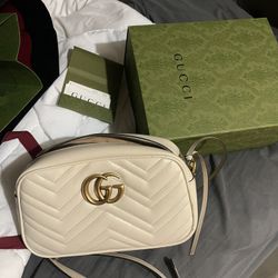 Gucci cross bun