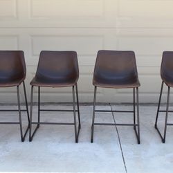 Set Of 4 Counter Stools From Ashley Furniture Store