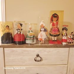 1 Porcelain Doll And 10 Dolls From Other Countries 