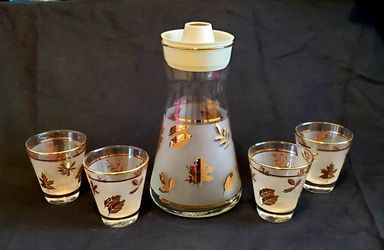 Mid-century modern gold leaf carafe and glasses.