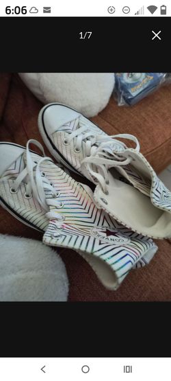 This is a Converse Chuck Taylor All Star High Metallic Exploding Star sneaker in white with a metallic rainbow geometric pattern. Women's! Size 10